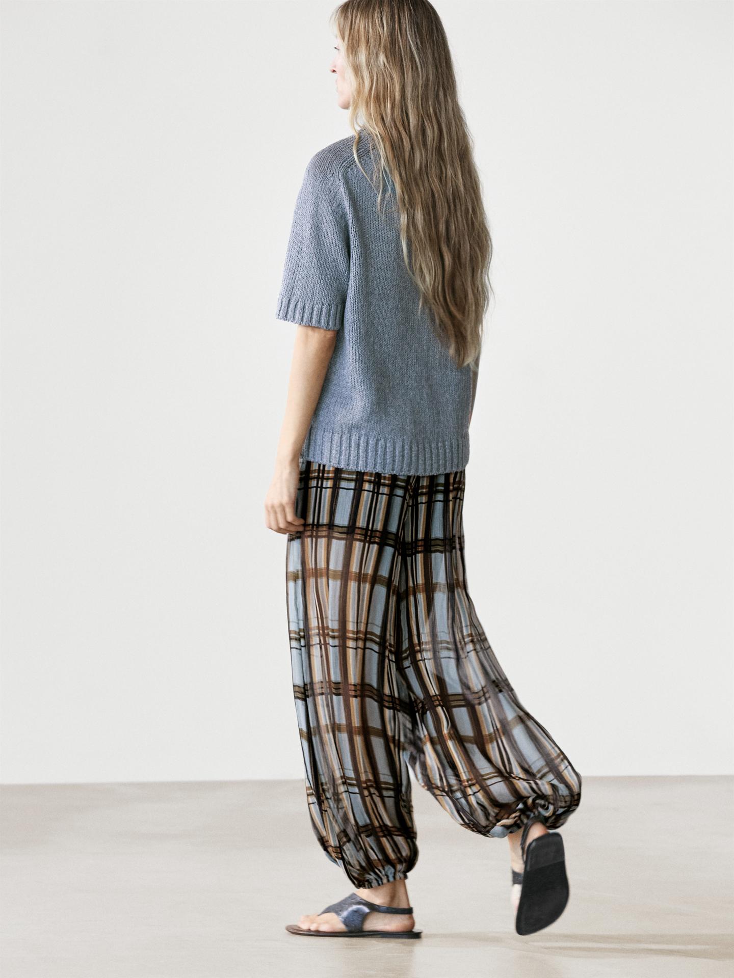 The Plaid Plissé Harem Pants, Designed with a relaxed, wide-leg