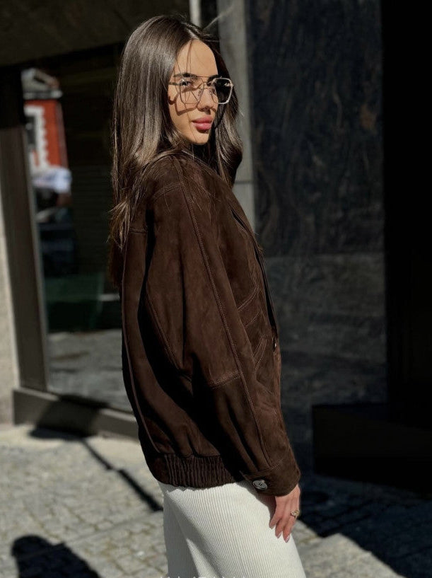 Our new suede bomber is a limited edition piece that’s flying off the shelves. Soft, structured, and stunning - Brown Jacket -