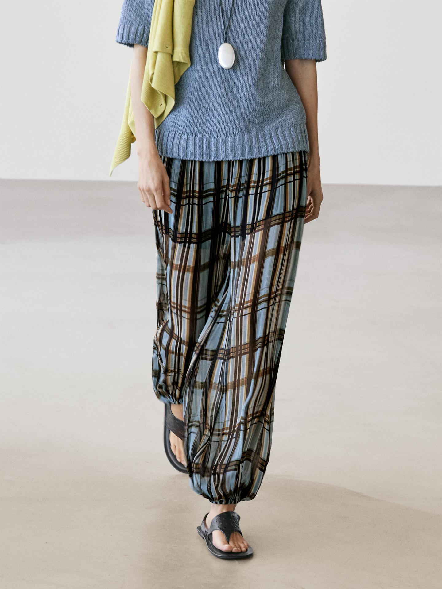 The Plaid Plissé Harem Pants, Designed with a relaxed, wide-leg