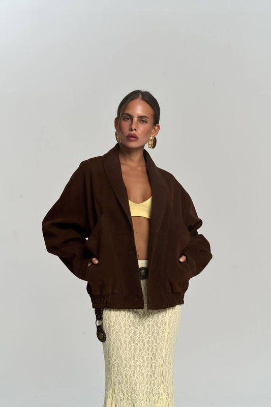 Our new suede bomber is a limited edition piece that’s flying off the shelves. Soft, structured, and stunning - Brown Jacket -