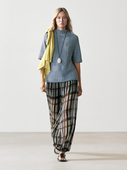 The Plaid Plissé Harem Pants, Designed with a relaxed, wide-leg
