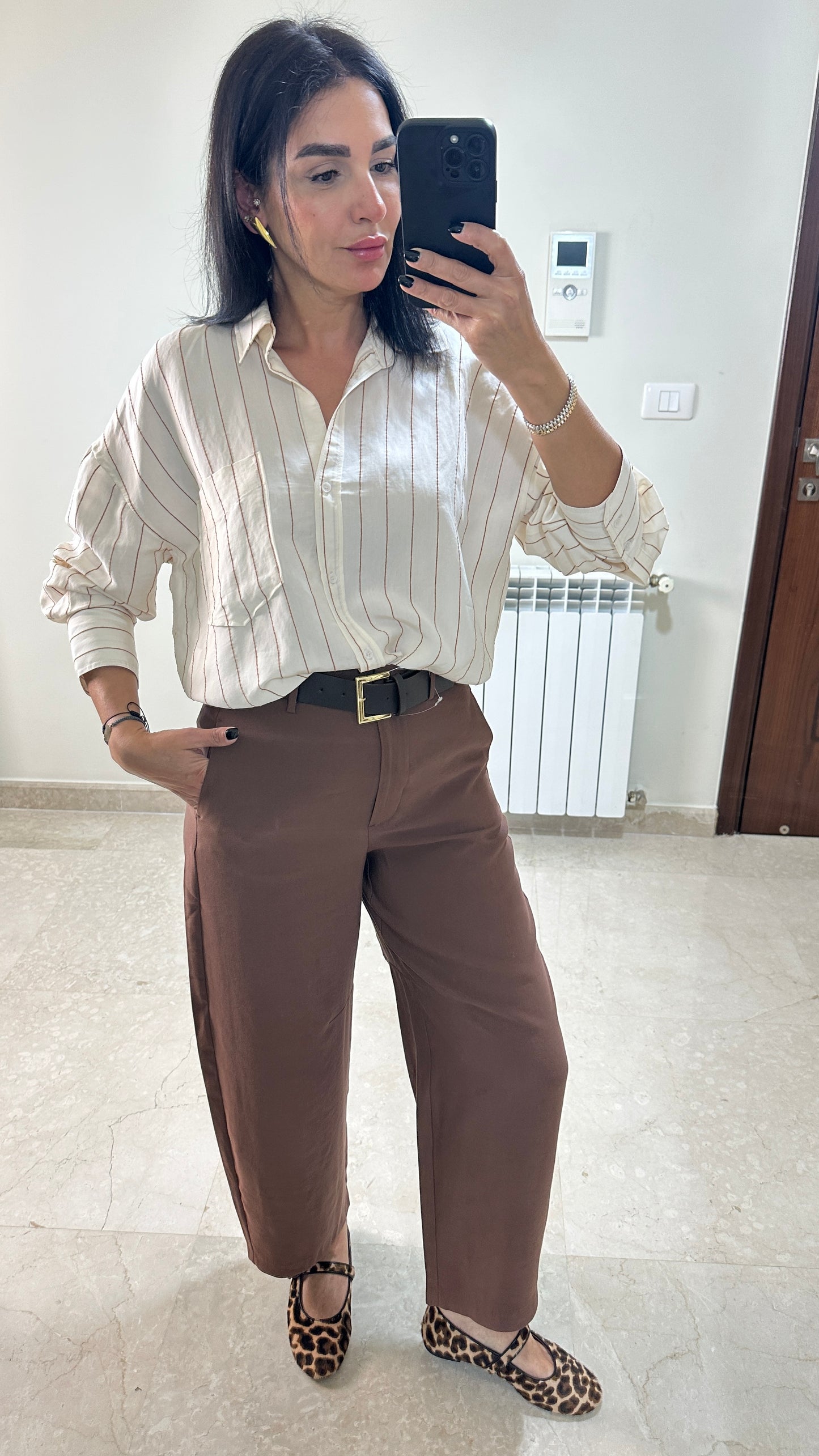 A masterwork of fluid tailoring Blouse