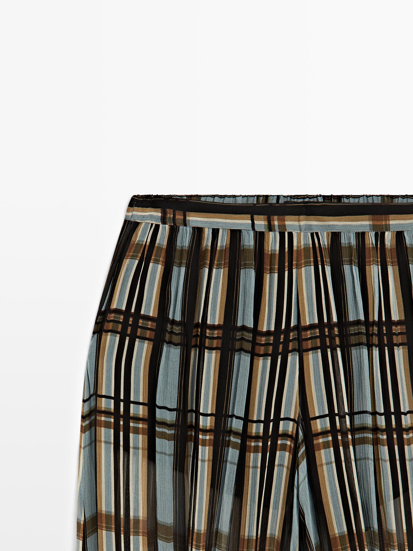 The Plaid Plissé Harem Pants, Designed with a relaxed, wide-leg