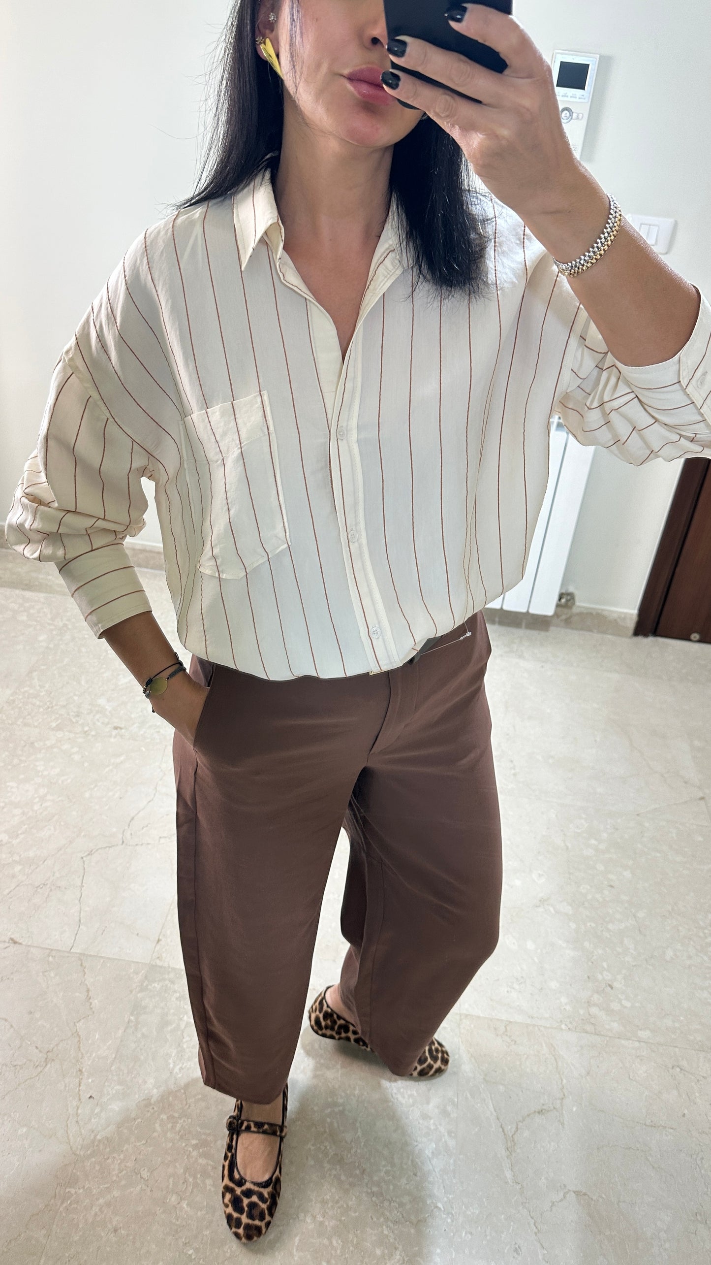A masterwork of fluid tailoring Blouse